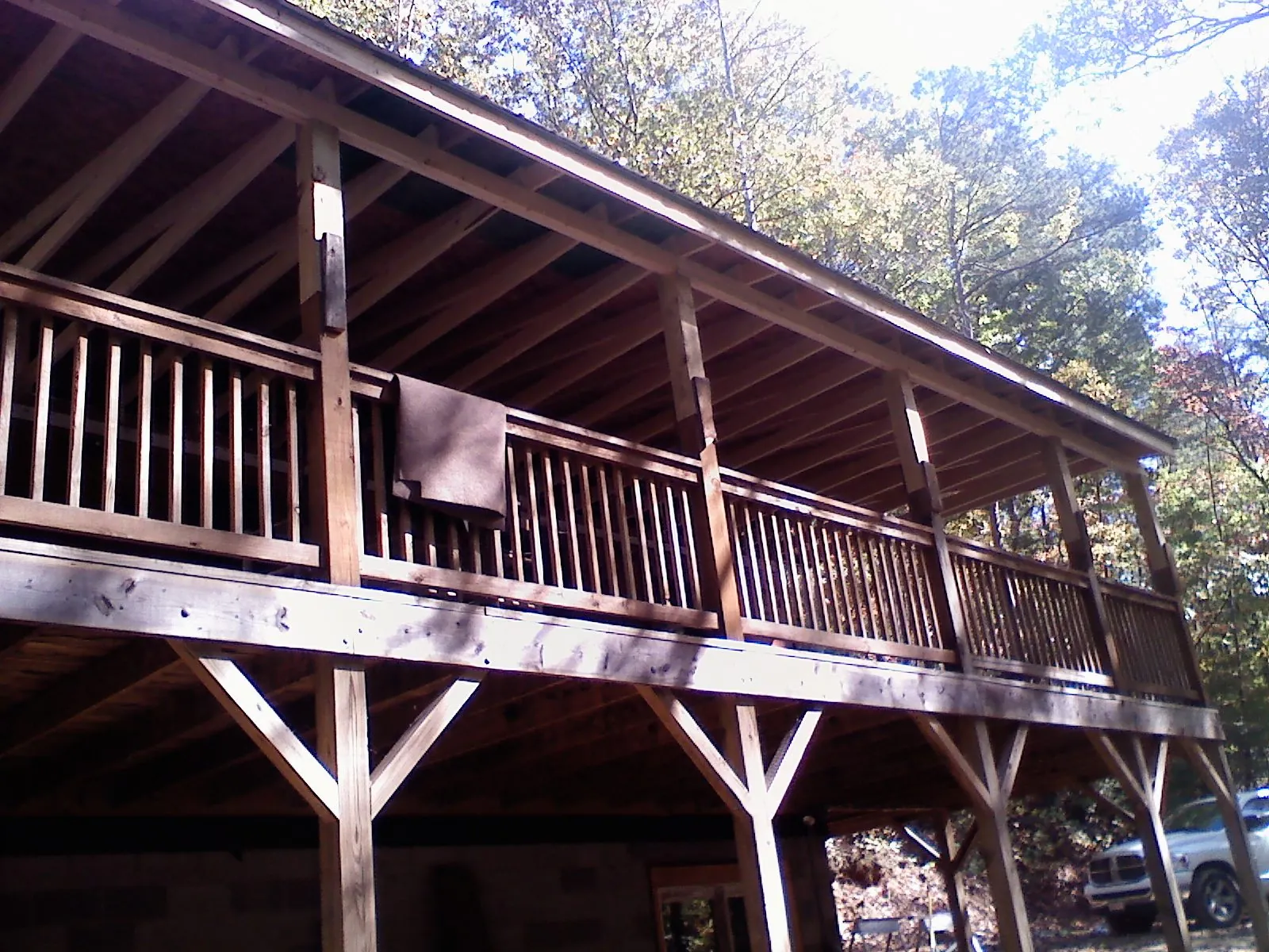 Timber framing under a new elevated porch and deck — Roof Leak Repair in Chicago Heights by Roofing Brothers